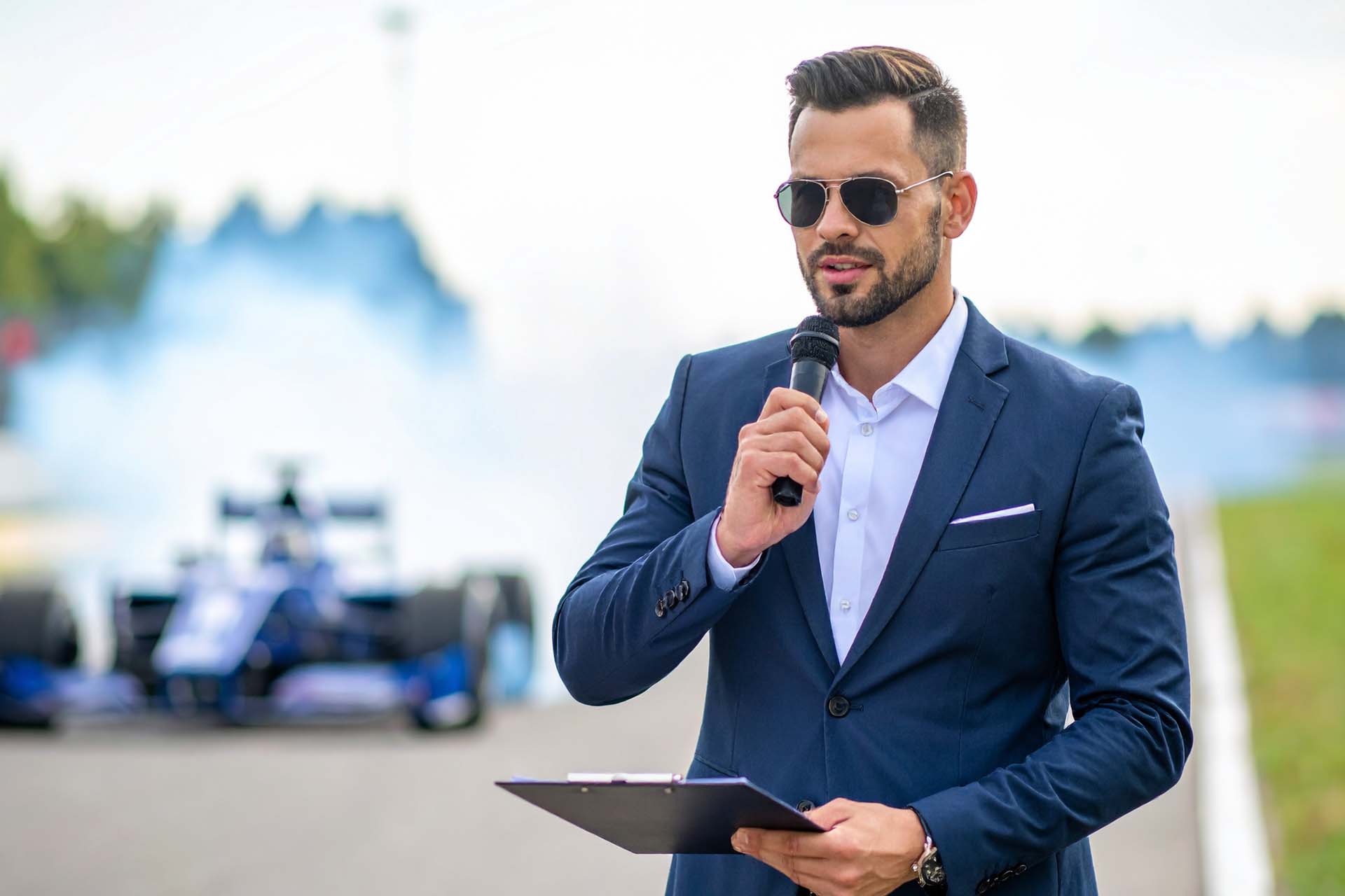 Public Relations and Copywriting 7 Pole motorsport PR brand racing driver celebrating a win.